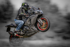 10-on-bike-wheelie